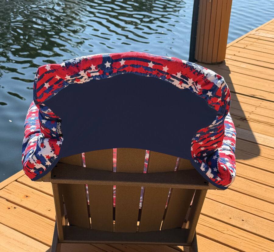 Navy spandex back of the Beach Towel Chair Blanket hugging the back of a chair